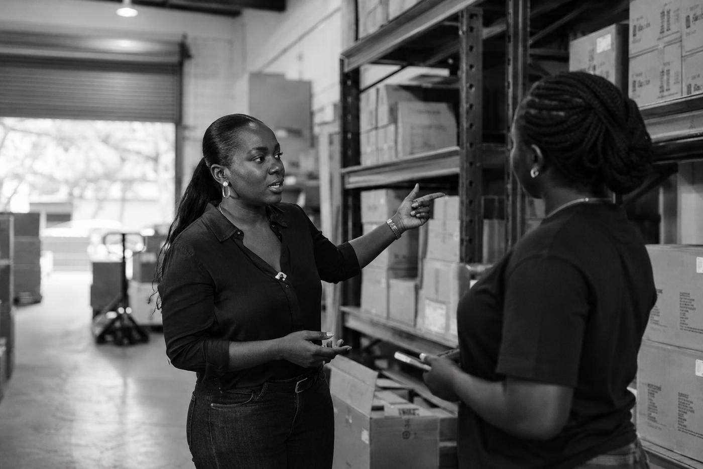 Founder reviewing figures with a team member