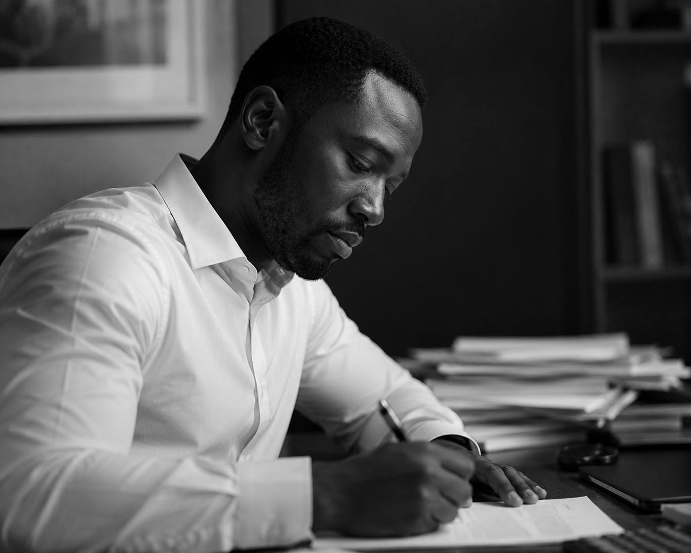 Leader reviewing a document